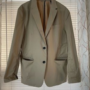 Tan 2 button blazer very light! Size is large it’s similar to slim fit